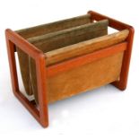 An Aksel Kjersgaard Danish design teak & suede two-division magazine rack, 49cms (19.25ins) wide.