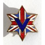 A rare WW2 gilt and enamel patriotic lapel badge featuring the Union Jack and a blue enamel V for