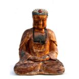 A large Chinese Ming gilt wood buddha seated in meditation, 43cms (17ins) high.Condition ReportLarge