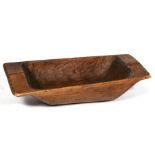 A wooden two-handled dough trough, 80cms (31.5ins) wide.