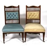 A pair of Edwardian walnut nursing chairs with upholstered seats & backs (2).