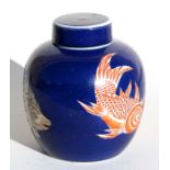 A 19th century Chinese ginger jar decorated with carp on a deep blue ground, 14.5cms (5.75ins)