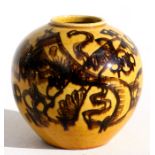 A Chinese vase of globular form decorated with a bridge on a yellow ground, with four-character blue