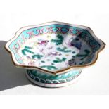 A Chinese famille rose footed bowl decorated with goldfish in enamel colours, 14cms (5.5ins) wide.