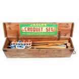 A Jacques croquet set in original pine box.