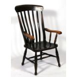 A Victorian Windsor armchair with slatted back.