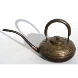 A late 19th century Japanese brass & copper water dropper decorated with a landscape, 14cms (5.5ins)