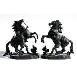 A pair of spelter Marley horses, 28cms (11ins) high.