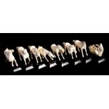 A group of eight early 20th century Chinese ivory Horses of Wang Mu, each approx. 7cms (2.75ins)