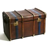 An Edwardian brass bound travelling trunk, 90cms (35.5ins) wide.