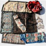 A group of 19th century & later Chinese silk embroideries including robe sleeves.