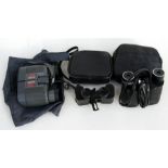 Three sets of compact binoculars including Nikon.