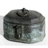 An Indian bronze pandan box with incised foliate decoration, 15cms (6ins) wide.