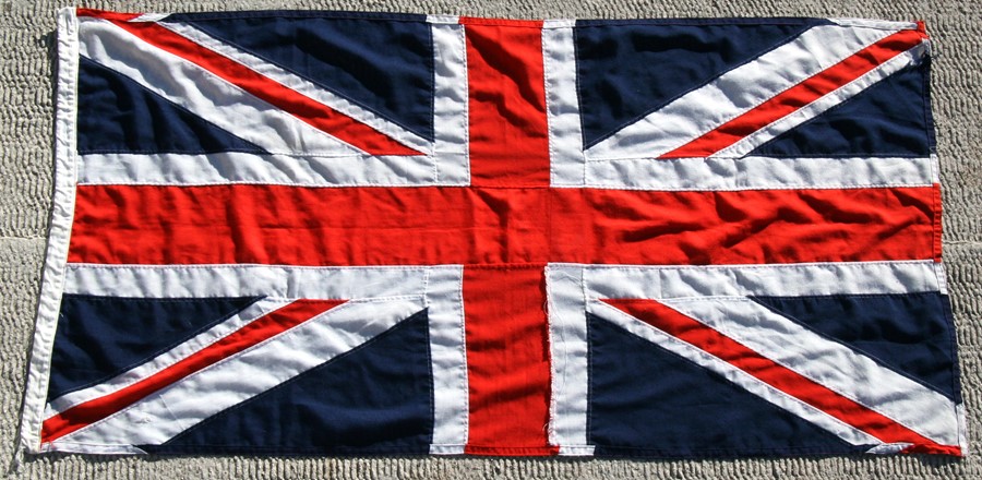 An original cloth Union Jack flag. 90cms (35.5ins) by 180cms (71ins)Condition ReportNo moth damage