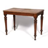A Victorian mahogany rectangular topped table on turned legs, 105cms (41.5ins) wide.