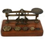 A Victorian Sampson Mordan brass and mahogany set of letter scales and weights, 16cms (6.25ins)