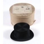 An early 20th century Henry Heath moleskin top hat, in original cardboard box.Condition