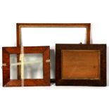 Three 19th century pictures frames, maple and rosewood, the largest 50 by 60cm (19.75 by 23.5 ins)