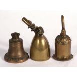 Three novelty table bells, one in the form of a pipe with a coiled serpent, one in the form of a