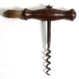 A Georgian mahogany cork screw with dusting brush, 12cms (4.75ins) high.