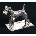 A silver figure of an Airedale terrier, Birmingham 1935, weight 270g, 7cms (2.75ins) high.