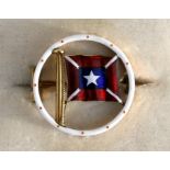 A Benzie of Cowes 18ct gold and enamel flag brooch in original box, 2cms (0.75ins) diameter.