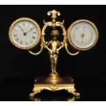 A late 19th century gilt metal figural clock barometer, 19cms (7.5ins) high.Condition ReportSome