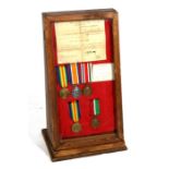 A WW1 medal pair with documents named to M2-048817 A-SGT. W.F. MOORE. A.S.C. together with a Special