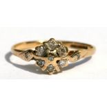 A 9ct gold diamond cluster ring, approx UK size 'L'.