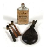 Three brass shot measurers; together with a leather shot flask and a flask containing shot.