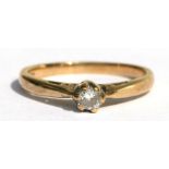 A 9ct gold diamond solitaire ring, approx UK size 'M'.