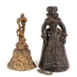 A 19th century bronze figural table bell in the form of an Elizabethan lady, 17.5cms (7ins) high;