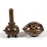 A Cowrie shell box with brass mounts; together with a bronze snuff (?) container, 8cms (3.1ins) high