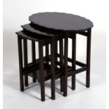 A nest of three oval mahogany tables, the largest 58cms (22.75ins) wide.