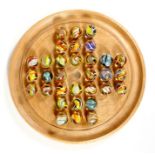 Thirty two handmade glass marbles, mainly multi-coloured latticino with spiraling decoration, each
