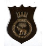 A bronze ships crest or plaque mounted on a bakelite shield to the Light Cruiser HMS Gambia. Overall