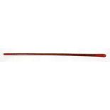 A red lacquer Kashmiri walking stick, 91.5cms (36ins) long.