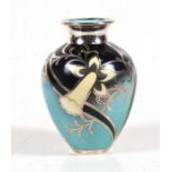 A Hutschenreuther Bavarian silver overlay porcelain vase decorated with daffodils on a turquoise