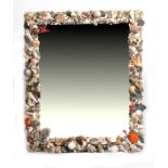 A shell framed mirror 76 by 91cm ( 30.25 by 35.75ins)