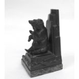 D Gilbert, a bronze study of a seated bear on a green figured marble base, 19cms (7.5ins) high.