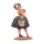 A late 19th / early 20th century American cast iron novelty rolling eye clock modelled as a lady