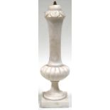 A carved alabaster table lamp, 50cms (19.75ins) high.