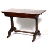 An early 19th century mahogany writing table, the rectangular top above a pair of frieze drawers, on