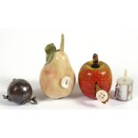 Four novelty sewing tape measures to include an apple and a pear, the largest 6cms (2.25ins) long (