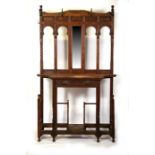 A large Victorian oak country house hall stand with mirrored back and single frieze drawer,