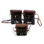 A pair of Carl Zeiss military field binoculars, cased; together with two pairs of Carl Zeiss Jena