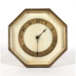 An Art Deco Goldsmith's & Silversmith's Ltd ivory faced octagonal desk clock, the chapter ring
