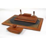 A mid 20th century leather desk set.