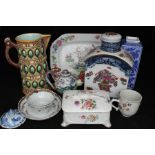 A Wedgwood majolica jug; together with a Chinese teapot decorated with dragons; a sardine dish;
