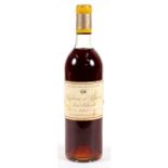 One bottle of Chateau d Yquem 1957 Lur-Saluces sauternes.Condition Report Very minor tear to right